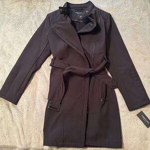 Kenneth Cole women’s coat with tags still attached.